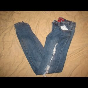 Red rivet skinny jeans size 3